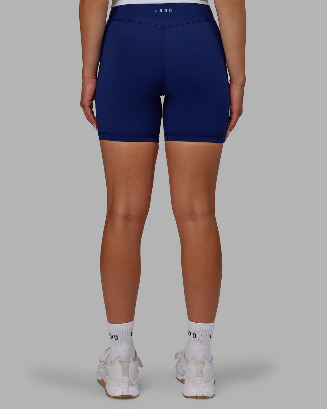 Woman wearing Elite High-Rise 6" Short Pockets - Midnight Blue - view 8
