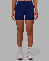 Woman wearing Elite High-Rise 4" Short Pockets - Midnight Blue | Thumbnail Index: 8