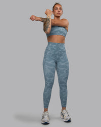 Woman wearing Elixir Ultra High-Rise 7/8 Legging Pockets - Tranquil-Elemental Blue | Model:Robyn | Size:S | Thumbnail Index: 5