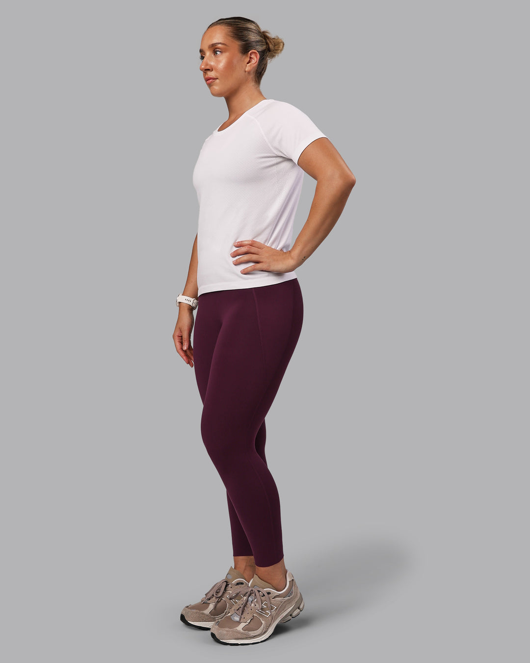 Woman wearing Elixir Ultra High-Rise 7/8 Legging Pockets - Cherry Lacquer | Model:Lyss | Size:S - view 3