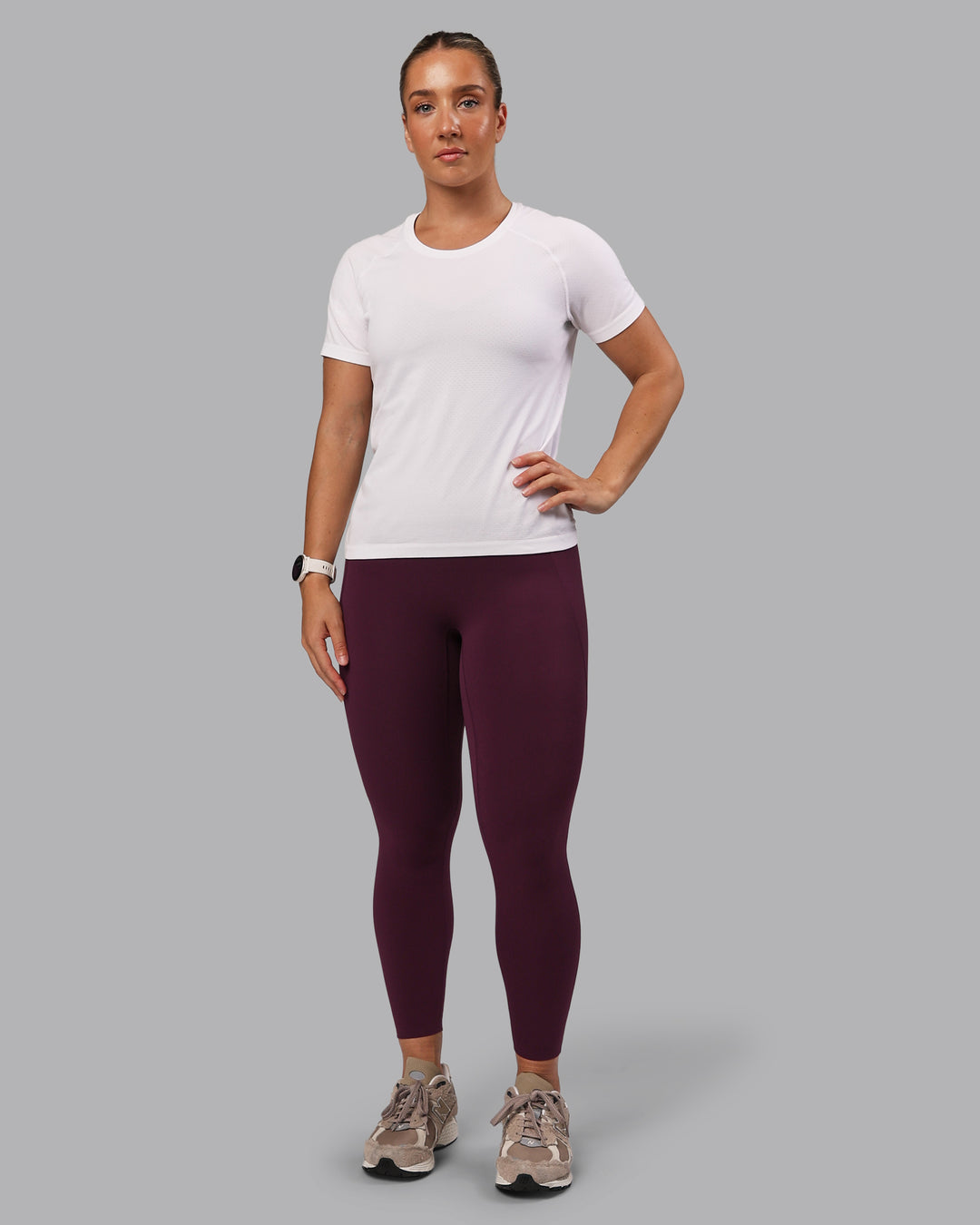 Woman wearing Elixir Ultra High-Rise 7/8 Legging Pockets - Cherry Lacquer | Model:Lyss | Size:S - view 8