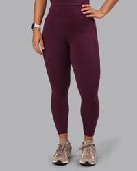 Woman wearing Elixir Ultra High-Rise 7/8 Legging Pockets - Cherry Lacquer | Model:Lyss | Size:S | Thumbnail Index: 9