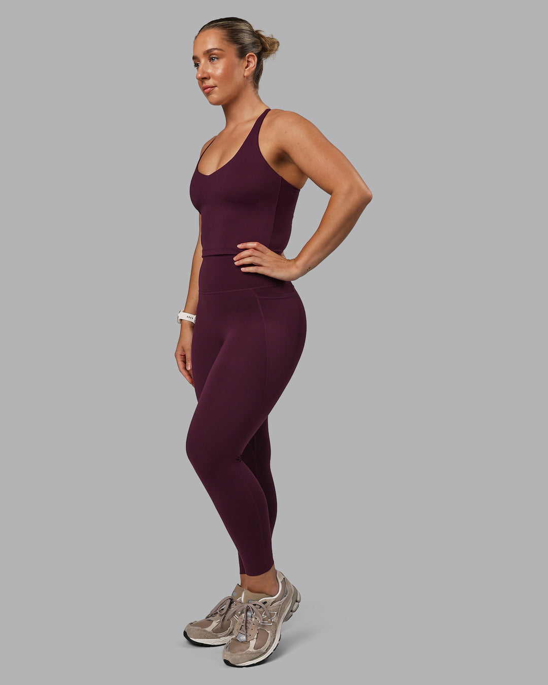 Woman wearing Elixir Ultra High-Rise 7/8 Legging Pockets - Cherry Lacquer | Model:Lyss | Size:S - view 6