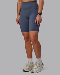 Woman wearing Elixir Ultra High-Rise 9" Short Pockets - Turbulence | Model:Suz | Size:S | Thumbnail Index: 5