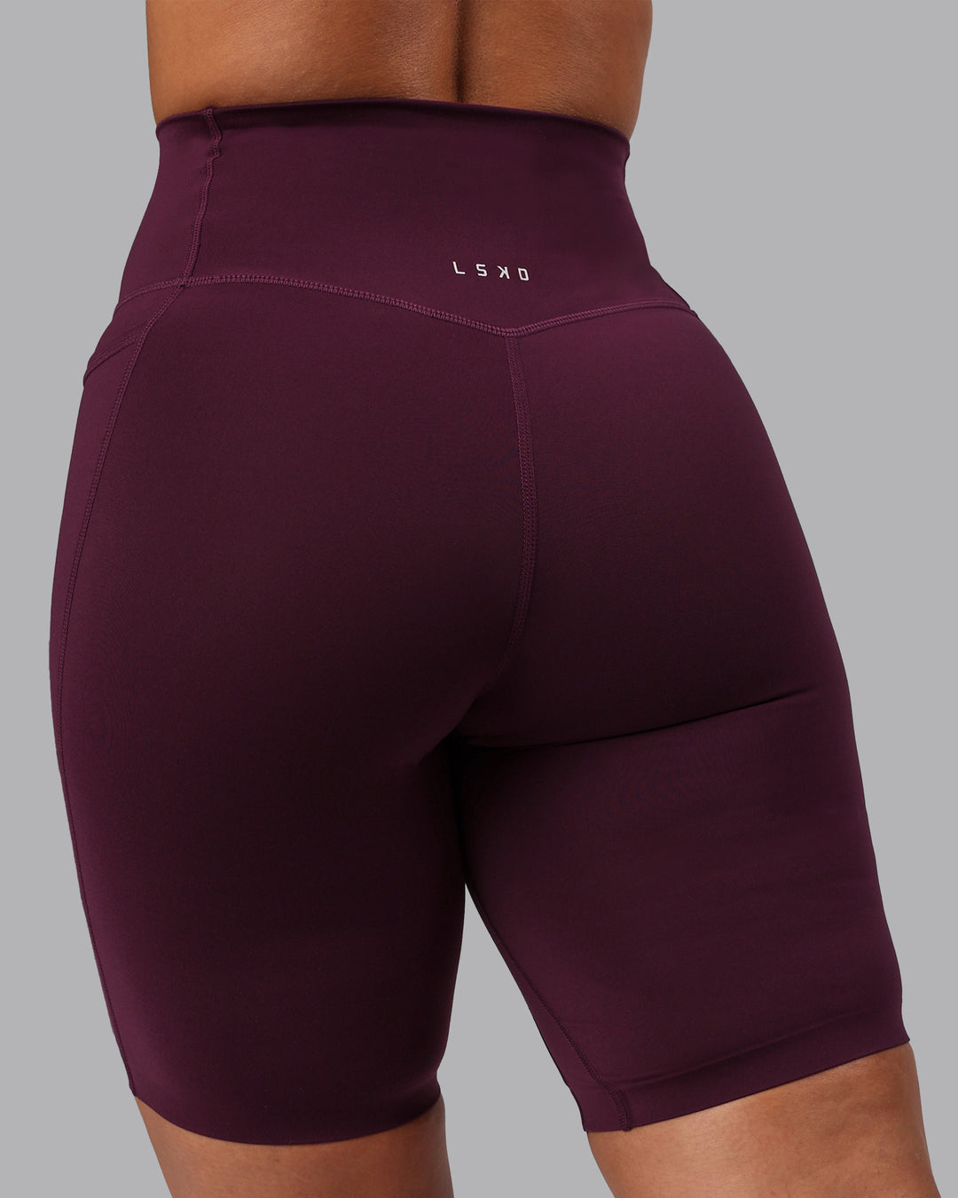 Woman wearing Elixir Ultra High-Rise 9" Short Pockets - Cherry Lacquer | Model:Lyss | Size:S - view 8
