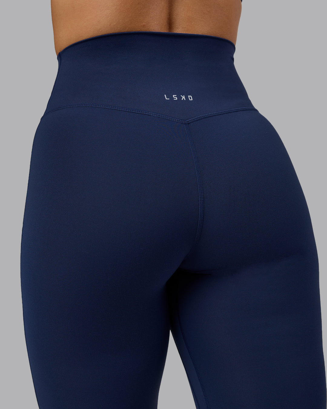 Woman wearing Elixir Ultra High-Rise Full Length Legging - Future Navy - view 9