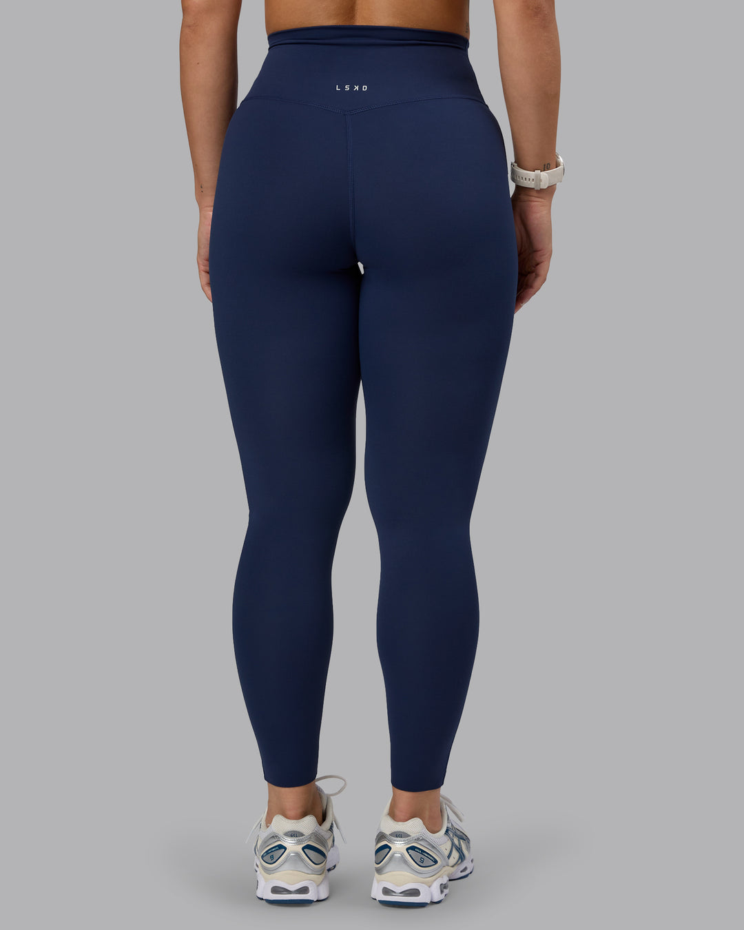 Woman wearing Elixir Ultra High-Rise Full Length Legging - Future Navy - view 4