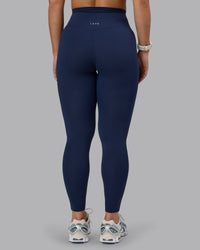 Woman wearing Elixir Ultra High-Rise Full Length Legging - Future Navy | Thumbnail Index: 3