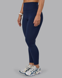 Woman wearing Elixir Ultra High-Rise Full Length Legging - Future Navy | Thumbnail Index: 7