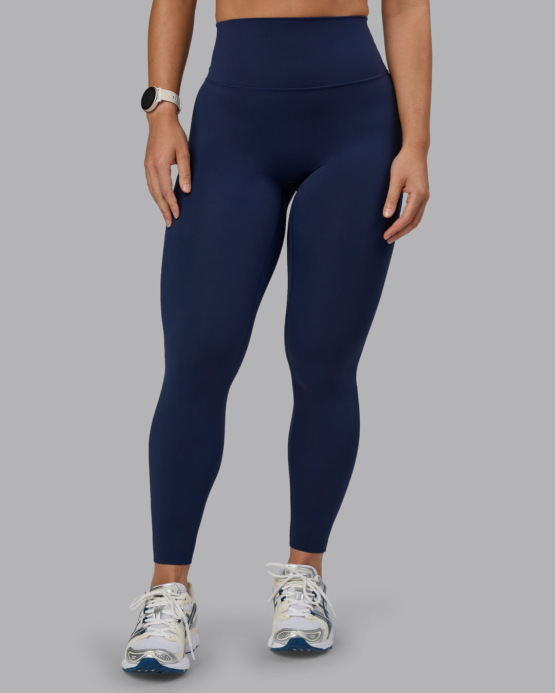 Woman wearing Elixir Ultra High-Rise Full Length Legging - Future Navy - view 1