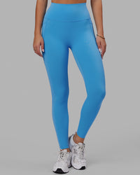 Woman wearing Elixir Ultra High-Rise Full Length Legging Pockets - Azure Blue | Thumbnail Index: 0