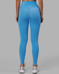 Woman wearing Elixir Ultra High-Rise Full Length Legging Pockets - Azure Blue | Thumbnail Index: 3