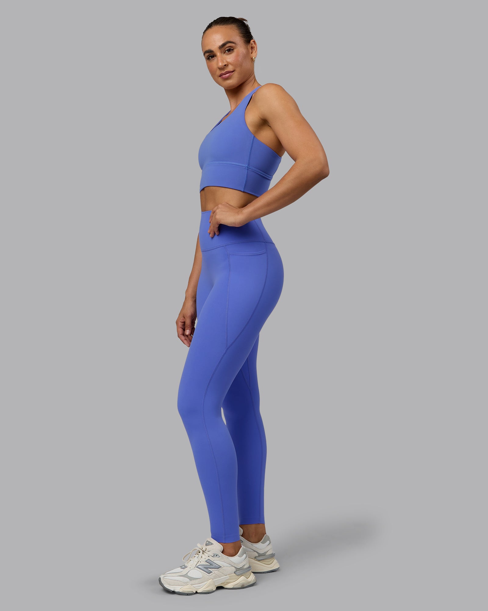 Woman wearing Elixir Ultra High-Rise Full Length Legging Pockets - Baja Blue