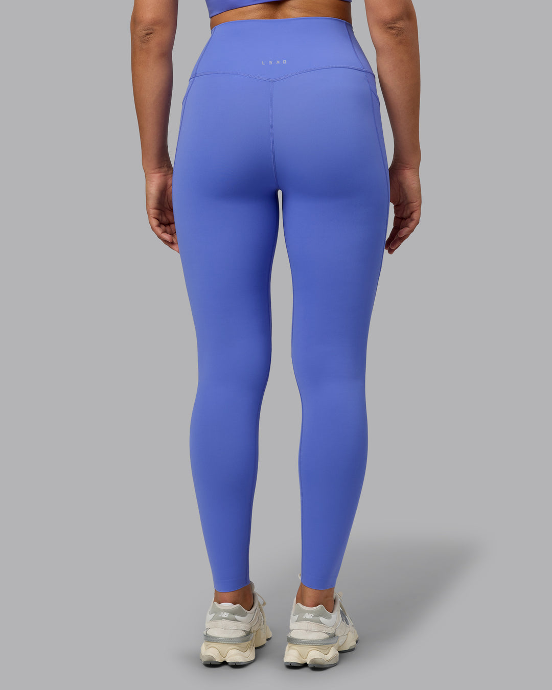 Woman wearing Elixir Ultra High-Rise Full Length Legging Pockets - Baja Blue - view 4