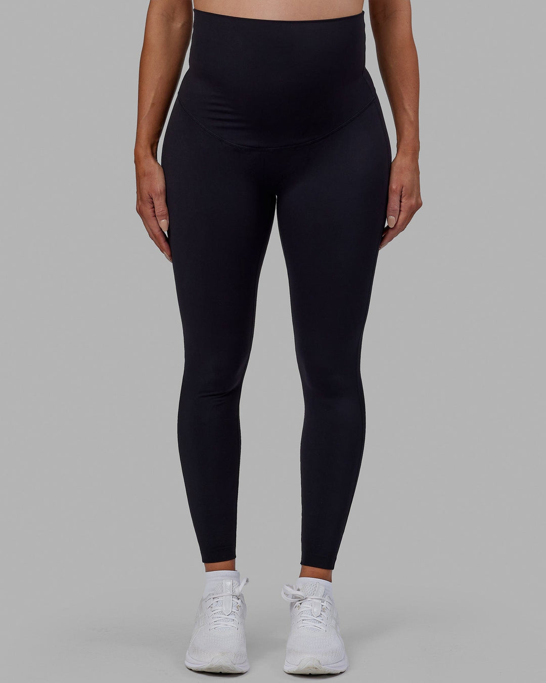 Woman wearing Elixir Ultra High-Rise Maternity Full Length Legging - Black | Model:Amanda | Size:S - view 10
