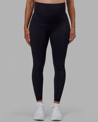 Woman wearing Elixir Ultra High-Rise Maternity Full Length Legging - Black | Model:Amanda | Size:S | Thumbnail Index: 9