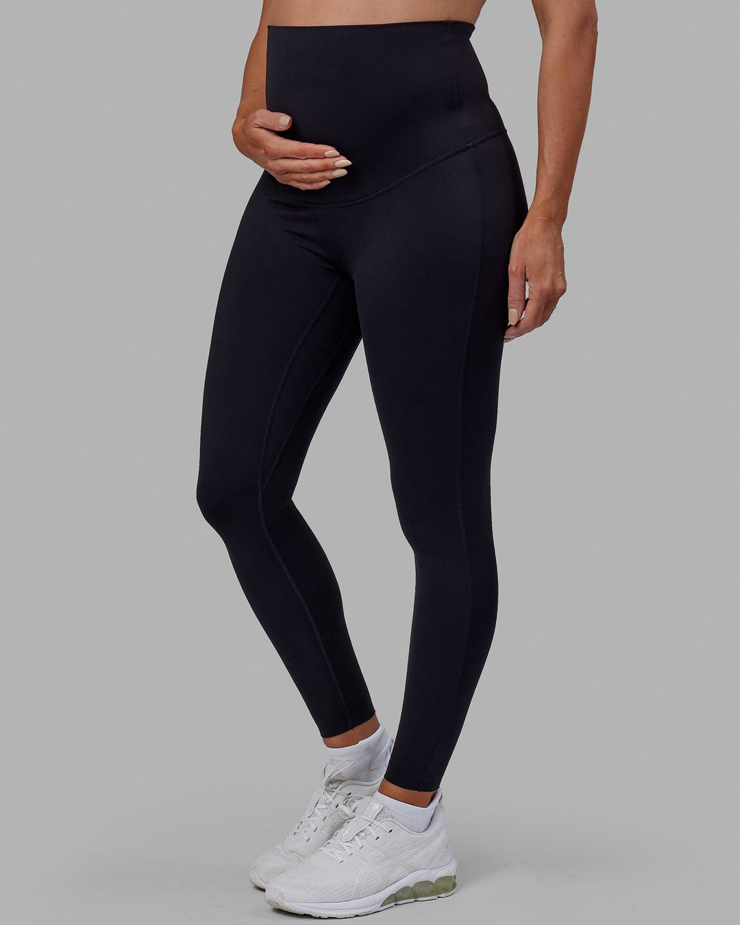 Woman wearing Elixir Ultra High-Rise Maternity Full Length Legging - Black | Model:Amanda | Size:S - view 8