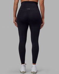 Woman wearing Elixir Ultra High-Rise Maternity Full Length Legging - Black | Model:Amanda | Size:S | Thumbnail Index: 4