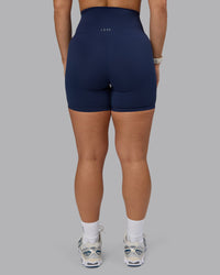 Woman wearing Elixir Ultra High-Rise 6" Short - Future Navy  | Model:Lyss | Size:S | Thumbnail Index: 5