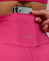 Woman wearing Elixir Ultra High-Rise 6" Short - Pink Flash | Thumbnail Index: 5