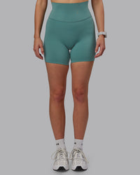 Woman wearing Elixir Ultra High-Rise 6" Short - Sagebrush | Thumbnail Index: 7