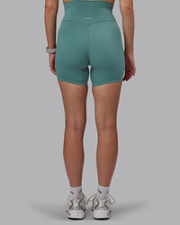 Woman wearing Elixir Ultra High-Rise 6" Short - Sagebrush | Thumbnail Index: 3