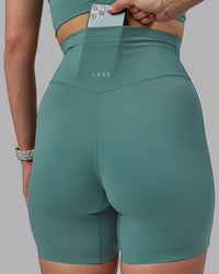 Woman wearing Elixir Ultra High-Rise 6" Short - Sagebrush | Thumbnail Index: 5