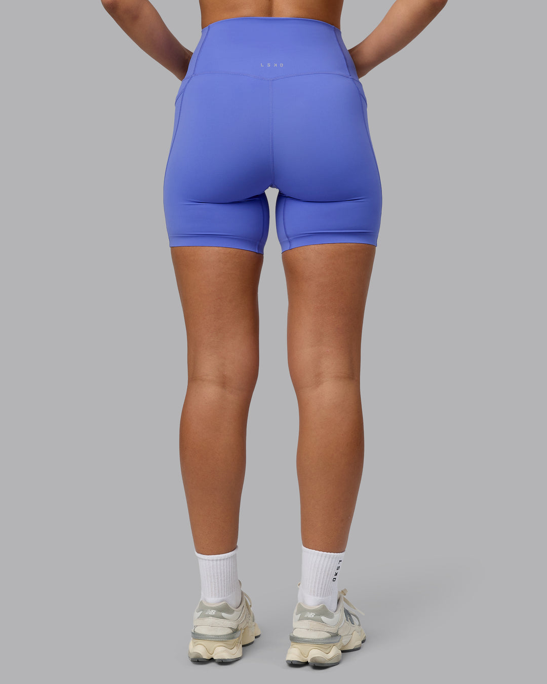 Woman wearing Elixir Ultra High-Rise 6" Short Pockets - Baja Blue - view 4