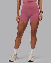 Woman wearing Elixir Ultra High-Rise 6" Short Pockets - Mauve Haze | Thumbnail Index: 0