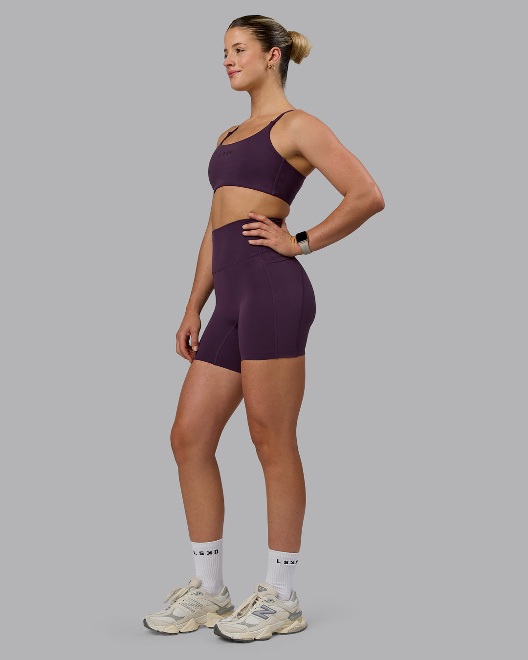 Woman wearing Elixir Ultra High-Rise 6" Short Pockets - Midnight Plum - view 7