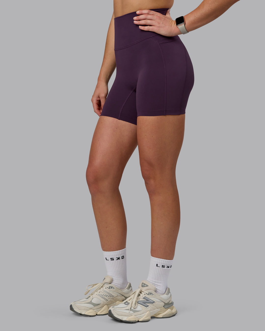 Woman wearing Elixir Ultra High-Rise 6" Short Pockets - Midnight Plum - view 8