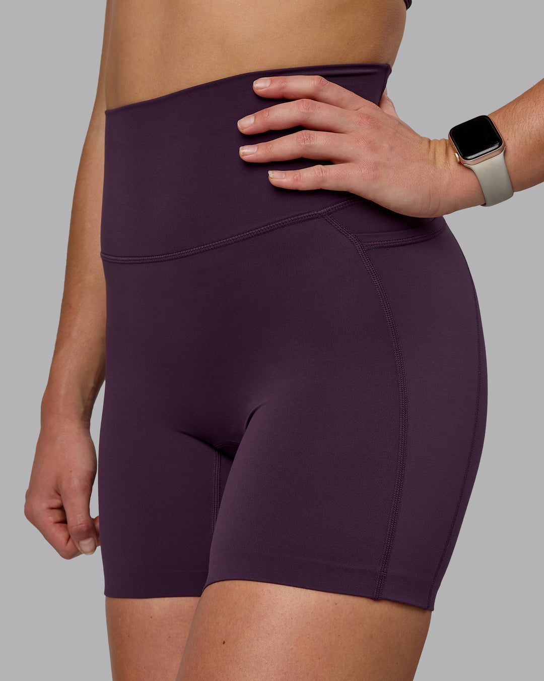 Woman wearing Elixir Ultra High-Rise 6" Short Pockets - Midnight Plum - view 6