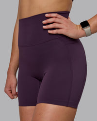 Woman wearing Elixir Ultra High-Rise 6" Short Pockets - Midnight Plum | Thumbnail Index: 5