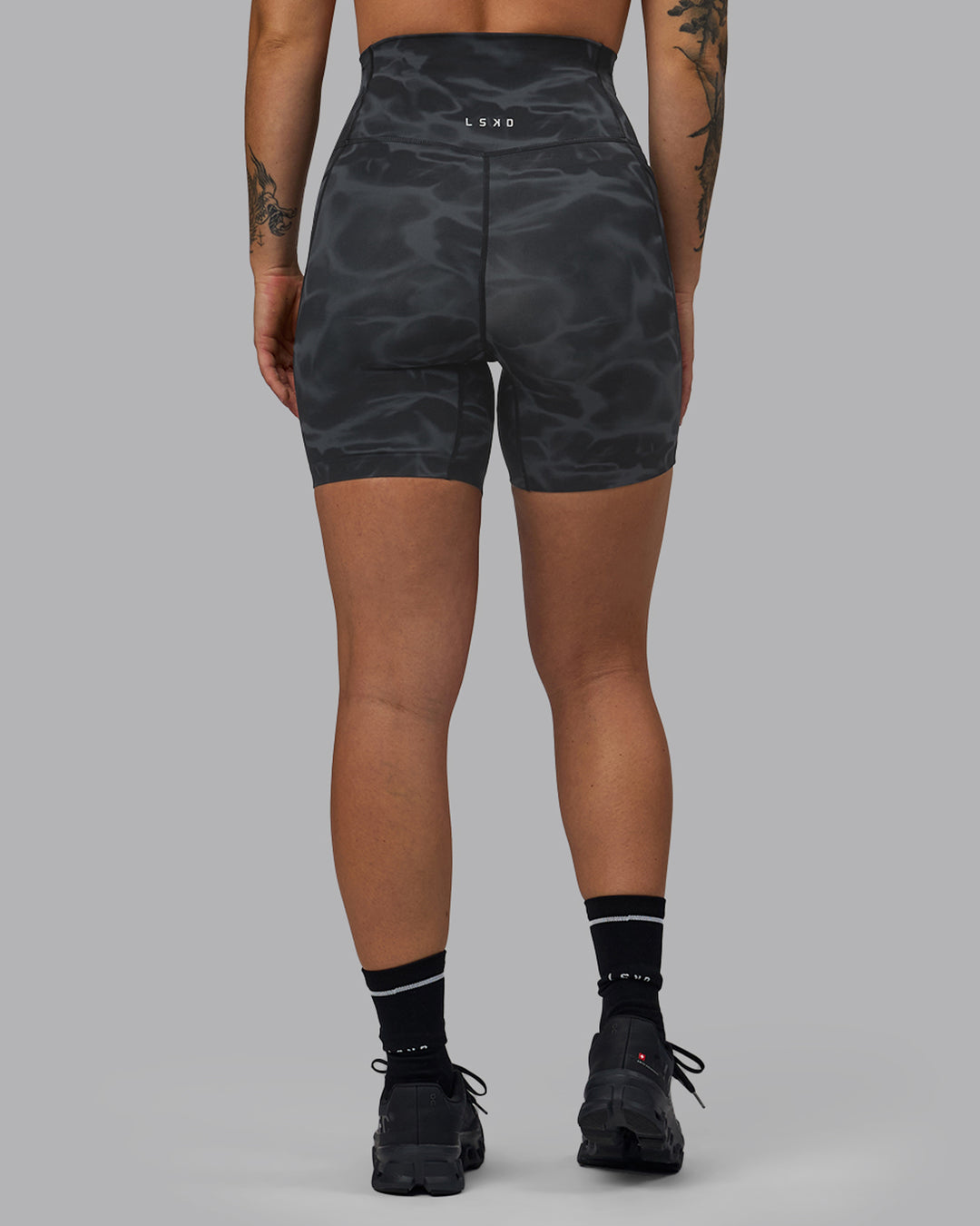 Woman wearing Elixir Ultra High-Rise 6" Short Pockets - Tranquil-Black - view 5