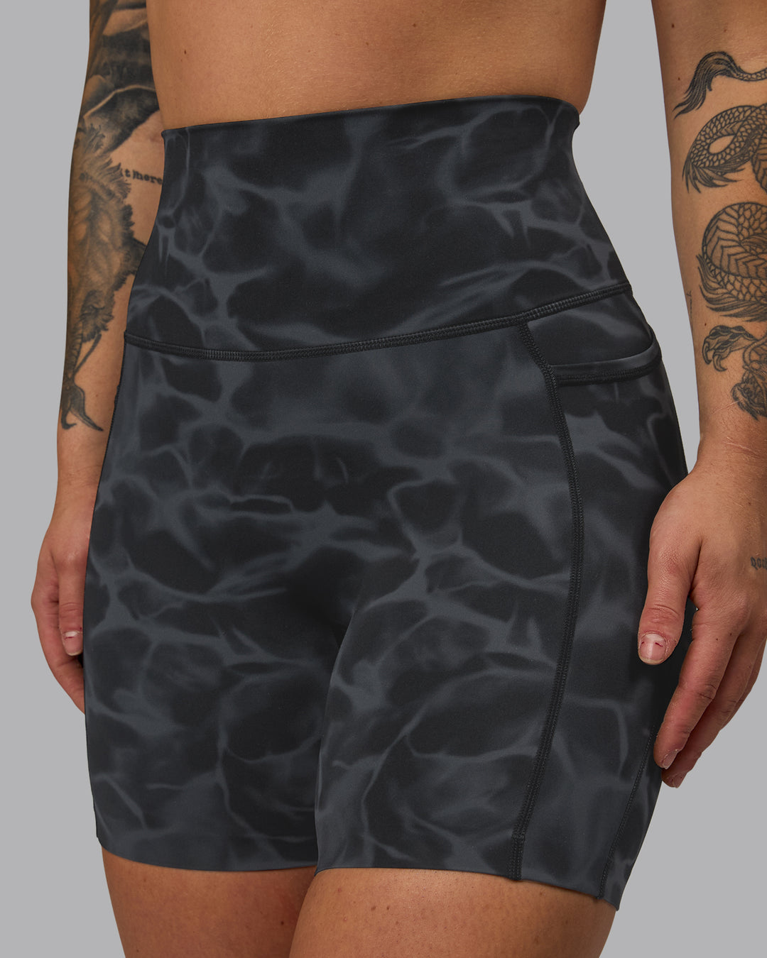 Woman wearing Elixir Ultra High-Rise 6" Short Pockets - Tranquil-Black - view 1