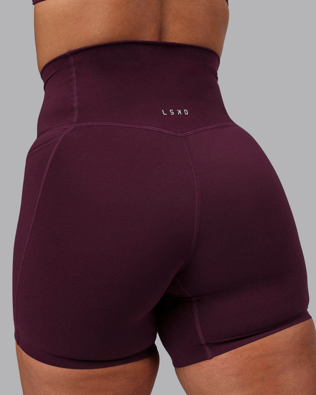 Woman wearing Elixir Ultra High-Rise 6" Short Pockets - Cherry Lacquer - view 8