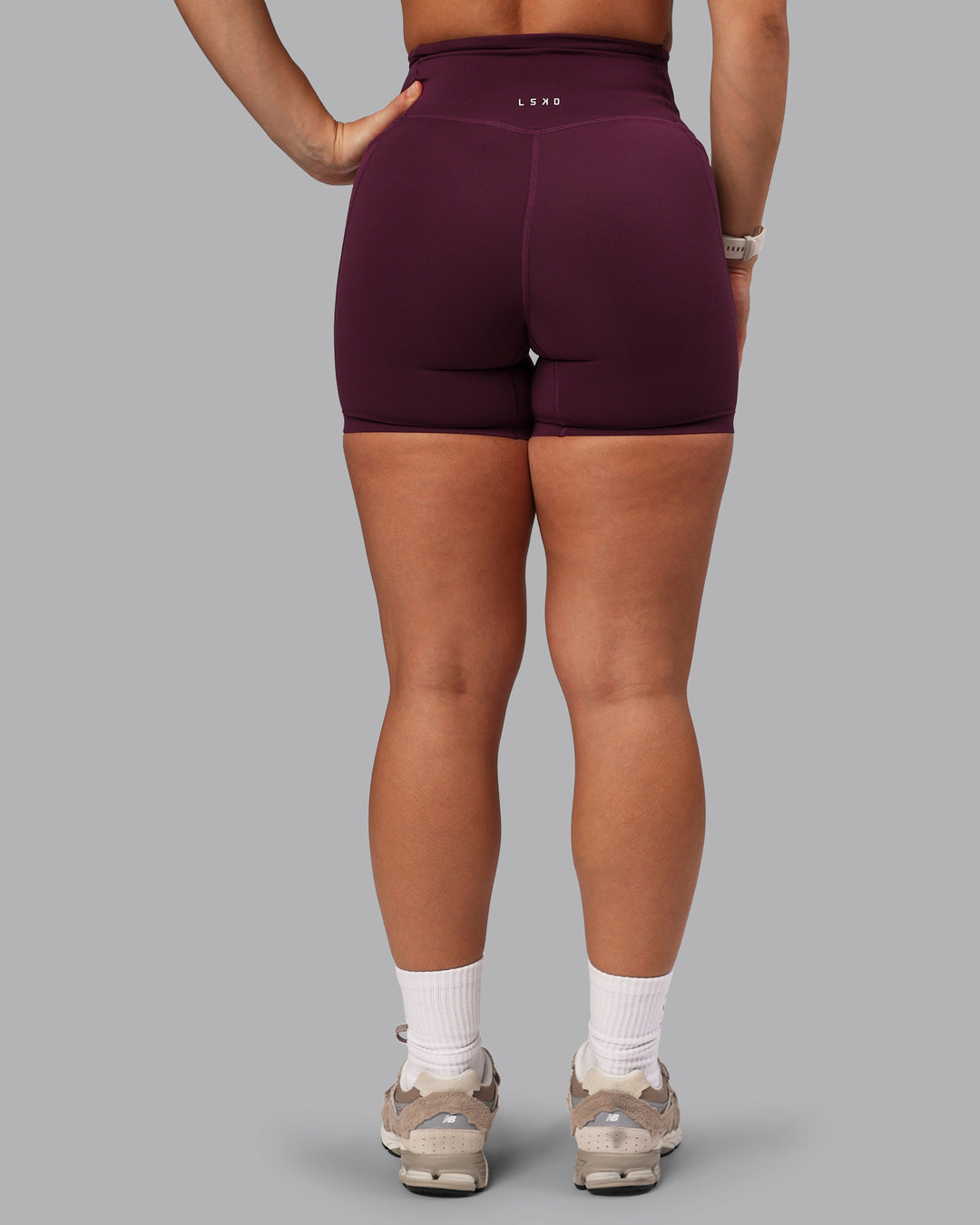 Woman wearing Elixir Ultra High-Rise 6" Short Pockets - Cherry Lacquer - view 4