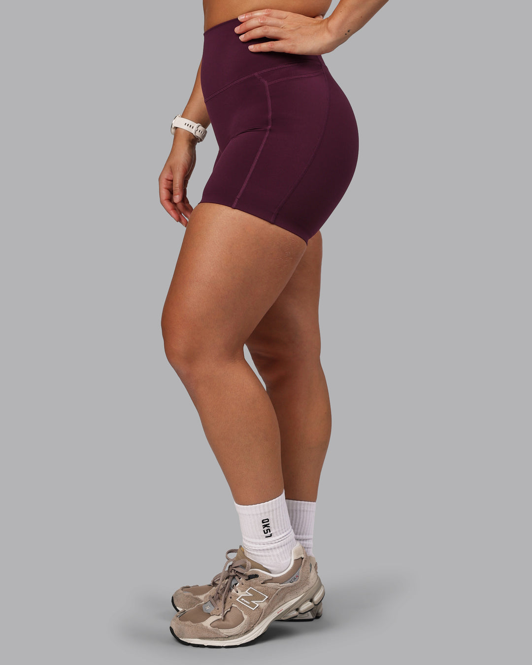 Woman wearing Elixir Ultra High-Rise 6" Short Pockets - Cherry Lacquer - view 9