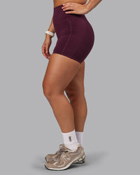 Woman wearing Elixir Ultra High-Rise 6" Short Pockets - Cherry Lacquer | Thumbnail Index: 8