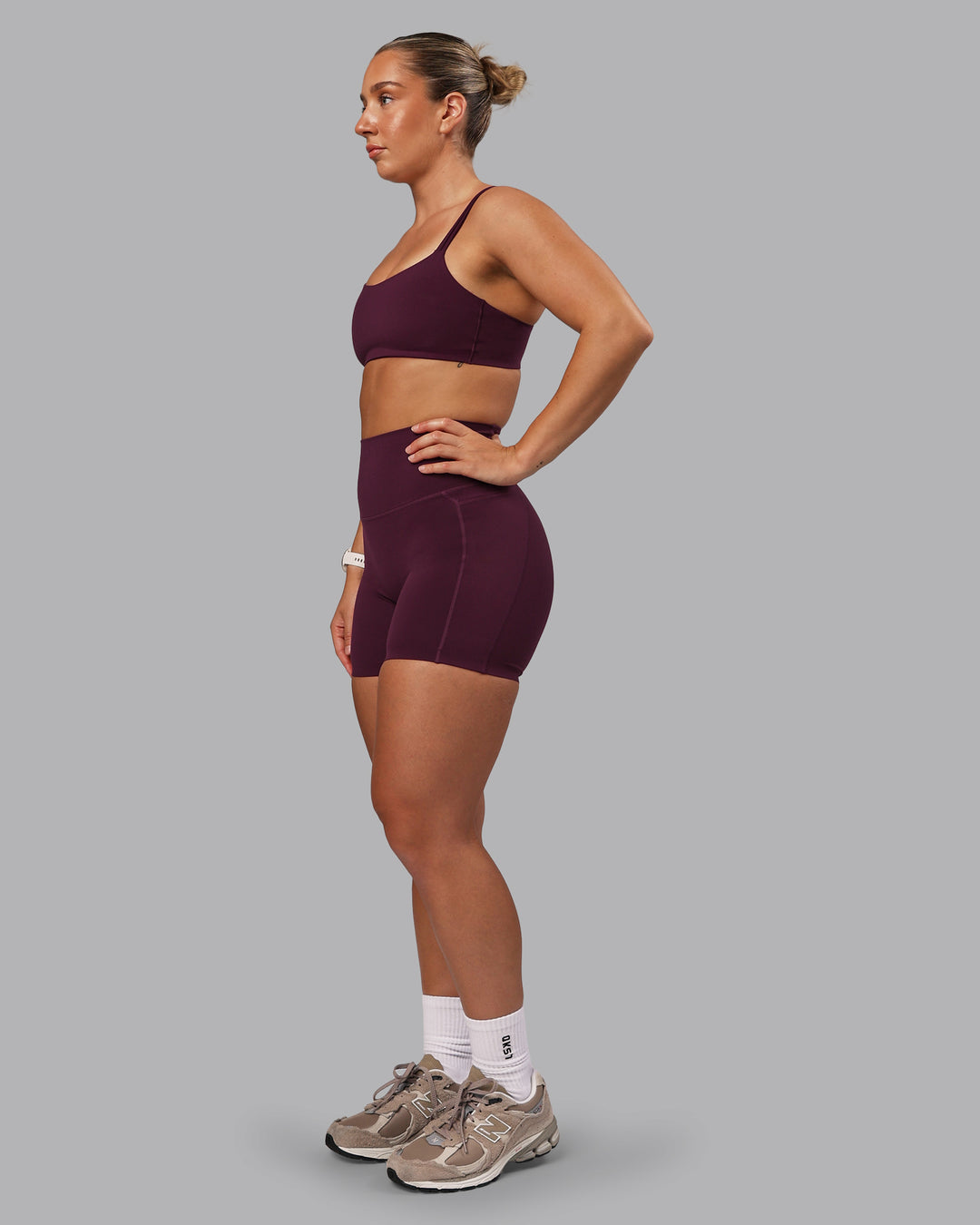 Woman wearing Elixir Ultra High-Rise 6" Short Pockets - Cherry Lacquer - view 5
