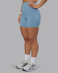 Woman wearing Elixir Ultra High-Rise 6" Short Pockets - Glacier Lake | Thumbnail Index: 8