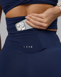 Woman wearing Elixir Ultra High-Rise 4" Short - Future Navy | Model:Lyss | Size:S | Thumbnail Index: 4