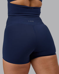 Woman wearing Elixir Ultra High-Rise 4" Short - Future Navy | Model:Lyss | Size:S | Thumbnail Index: 6