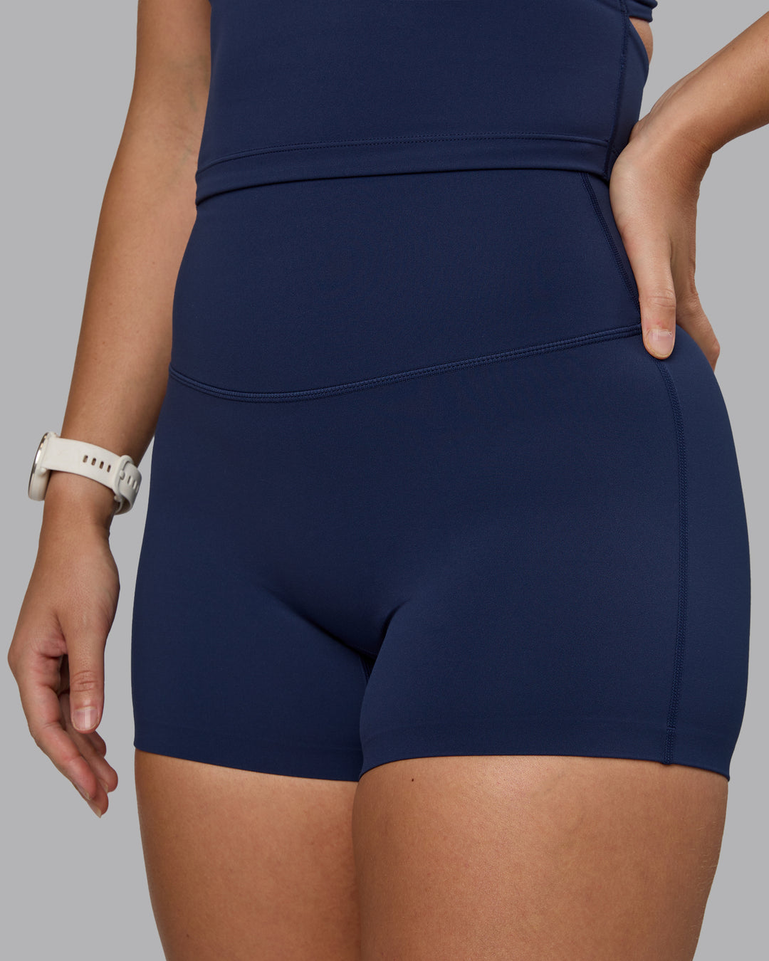 Woman wearing Elixir Ultra High-Rise 4" Short - Future Navy | Model:Lyss | Size:S - view 9
