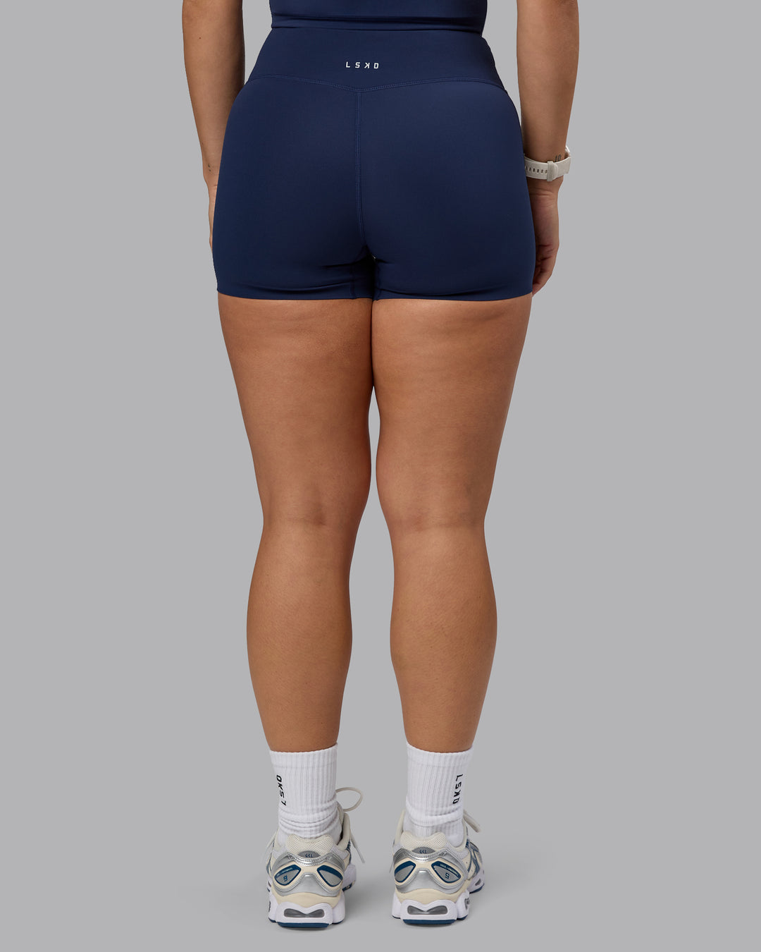 Woman wearing Elixir Ultra High-Rise 4" Short - Future Navy | Model:Lyss | Size:S - view 10