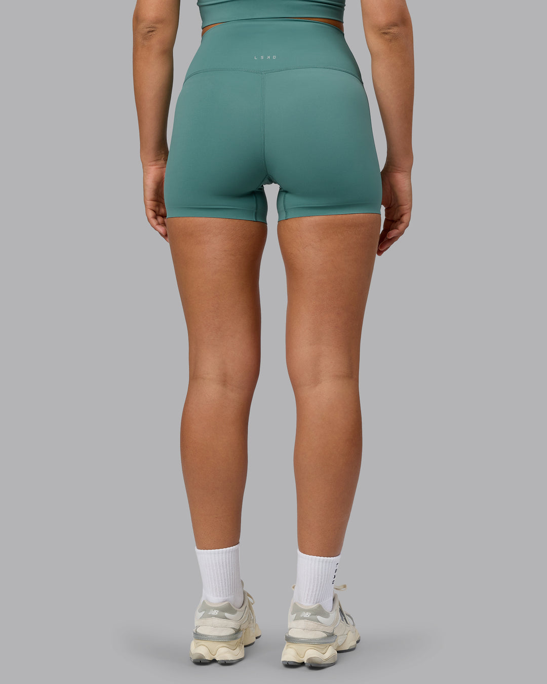 Woman wearing Elixir Ultra High-Rise 4" Short - Sagebrush | Model:Sophie | Size:S - view 4