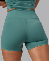 Woman wearing Elixir Ultra High-Rise 4" Short - Sagebrush | Model:Sophie | Size:S | Thumbnail Index: 9