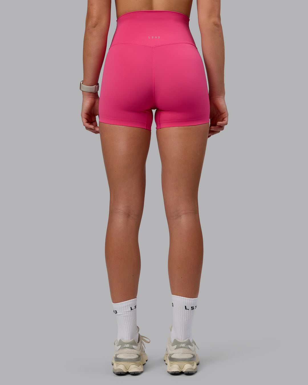 Woman wearing Elixir Ultra High-Rise 4" Short - Pink Flash | Model:Chloe | Size:XS - view 4