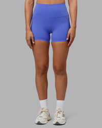 Woman wearing Elixir Ultra High-Rise 4" Short Pockets - Baja Blue | Model:Sophie | Size:S | Thumbnail Index: 7