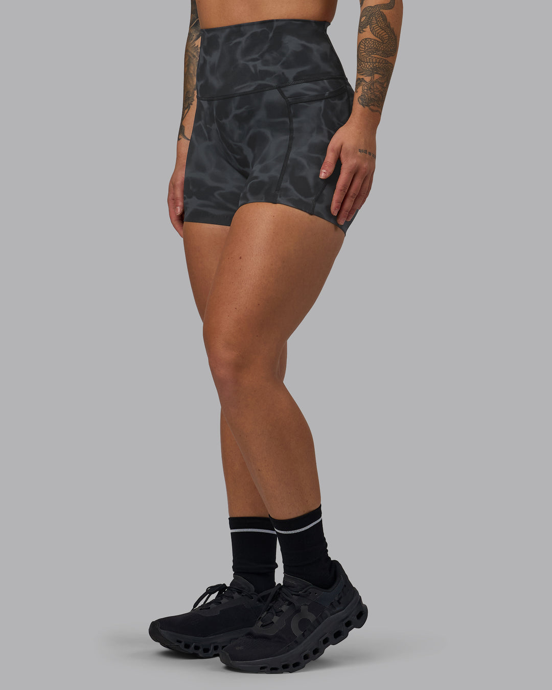 Woman wearing Elixir Ultra High-Rise 4" Short Pockets - Tranquil-Black | Model:Robyn | Size:S - view 9